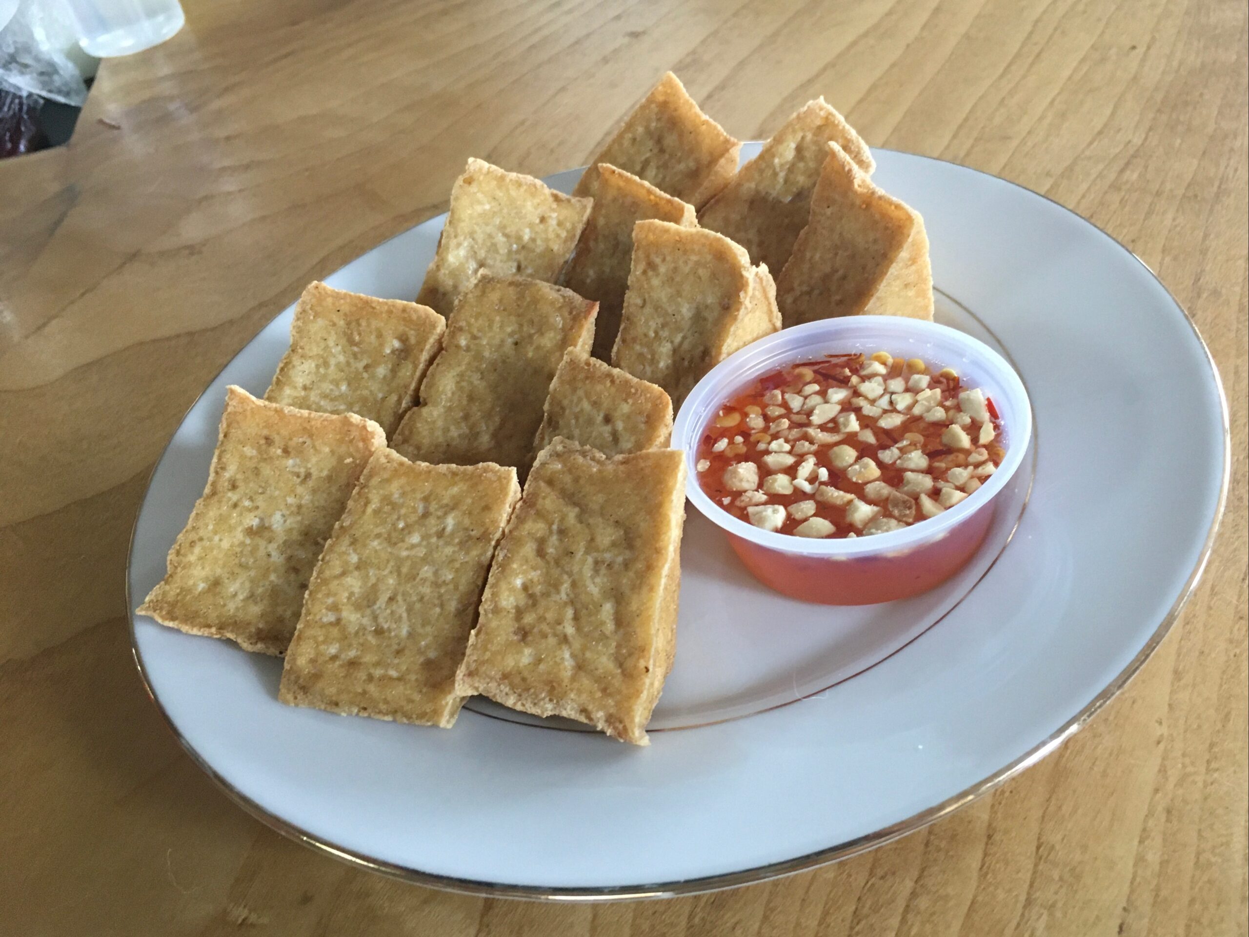 Thai fried tofu served with sweet chilli peanut dipping sauce